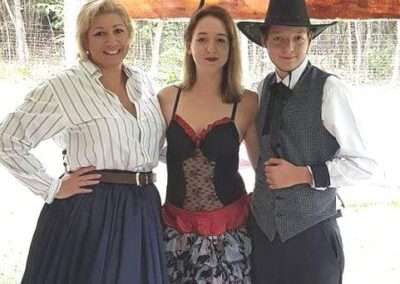 Three people in wild west costume for our Way out West murder mystery game.