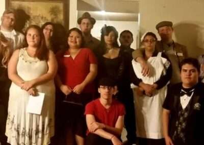 People dressed in costumer for our Death on the Rocks murder mystery game.